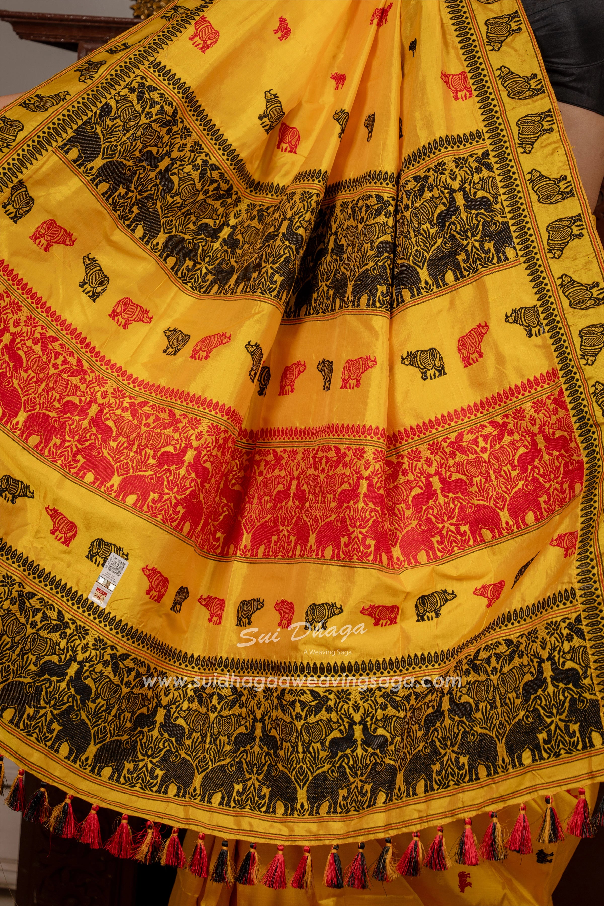 Yellow Coloured Handwoven Mulberry Exclusive Kaziranga Assam saree