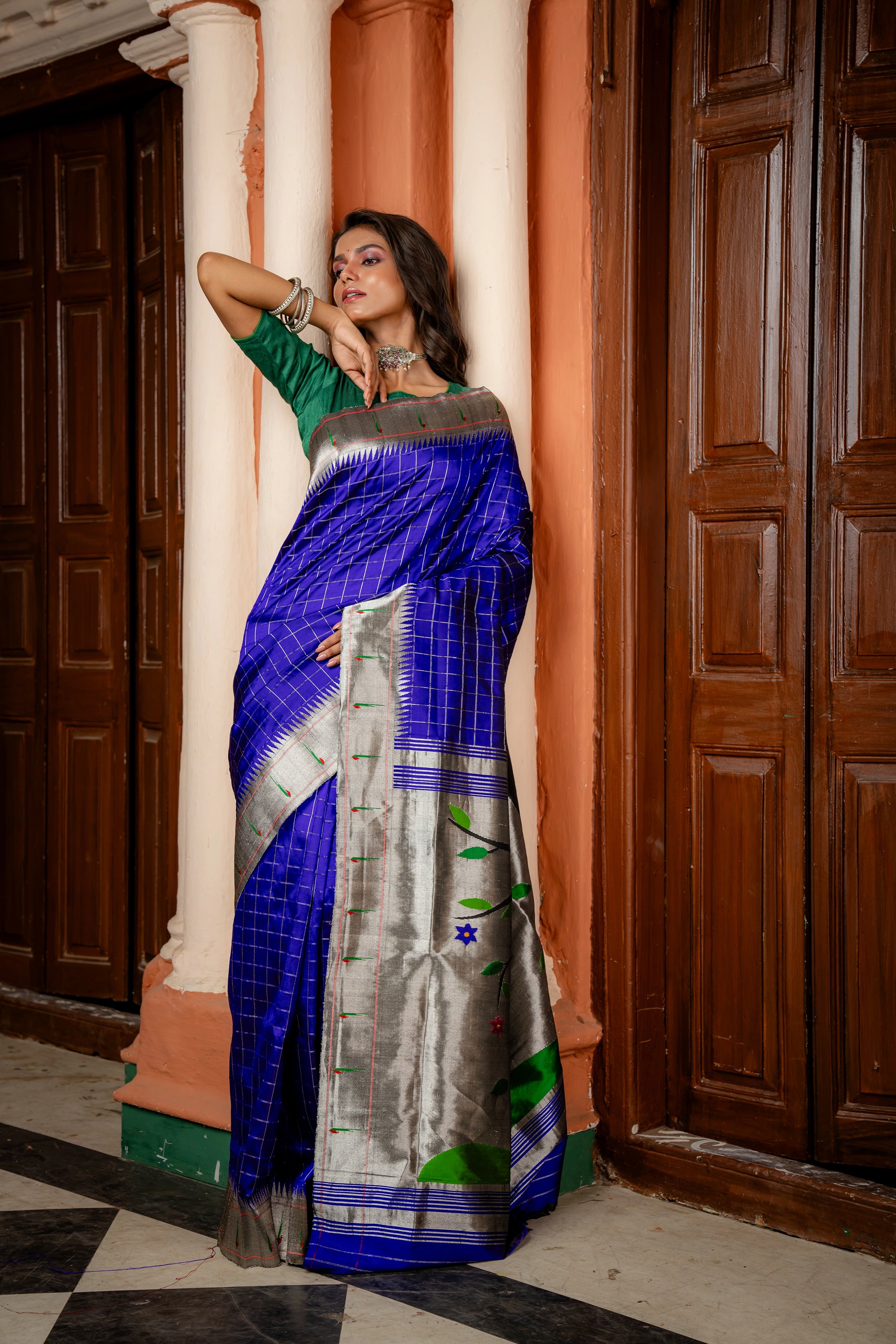 Handloom Pure Silk Silver Zari Muniya Border with Exclusive Radha Krishna Pallu in Royal Blue