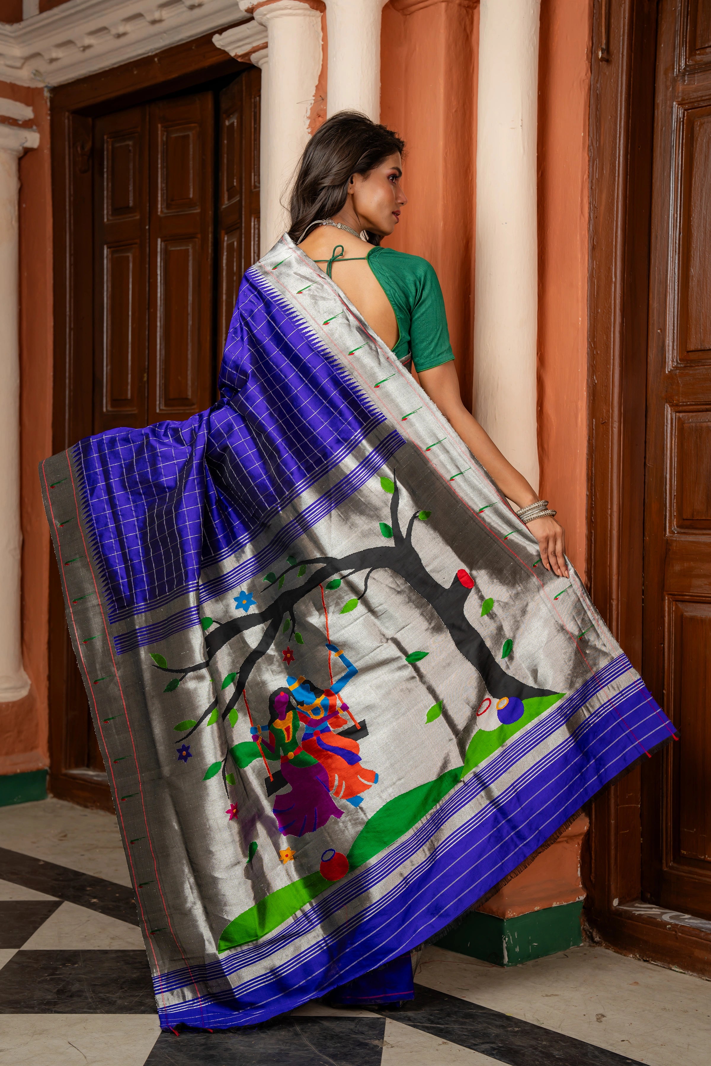 Handloom Pure Silk Silver Zari Muniya Border with Exclusive Radha Krishna Pallu in Royal Blue