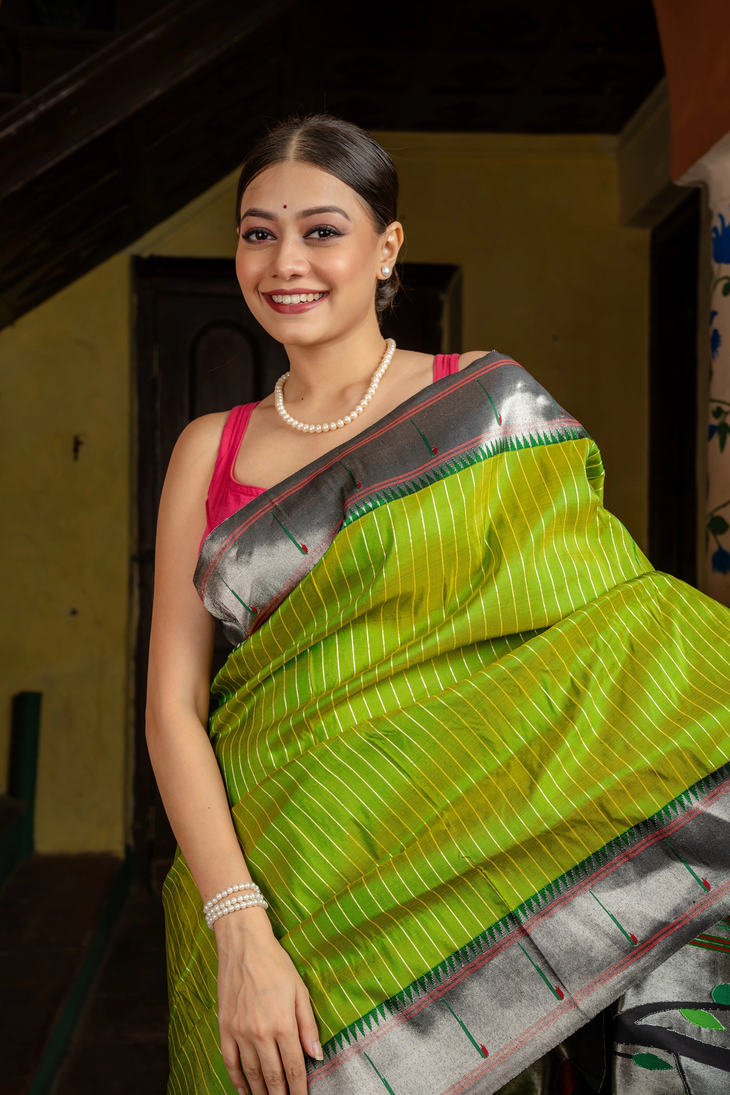 Handloom Pure Silk Silver Zari Muniya Border with Exclusive Radha Krishna Pallu in Green