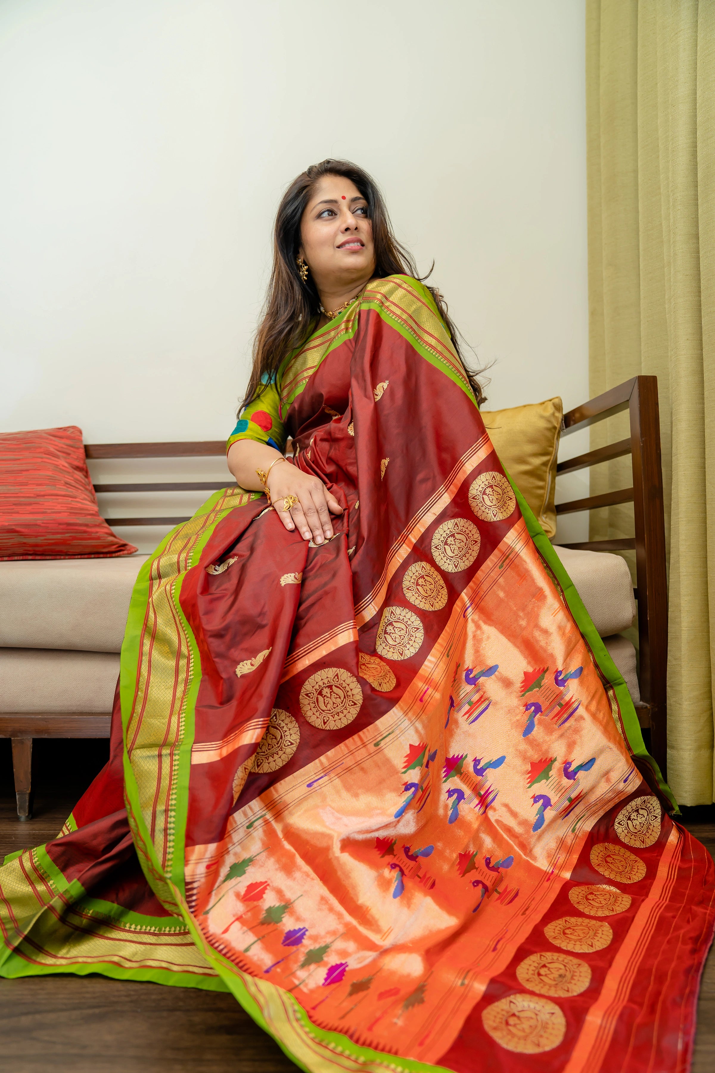 Pure silk Handwoven Paithani with traditonal pallu and chakra motifs