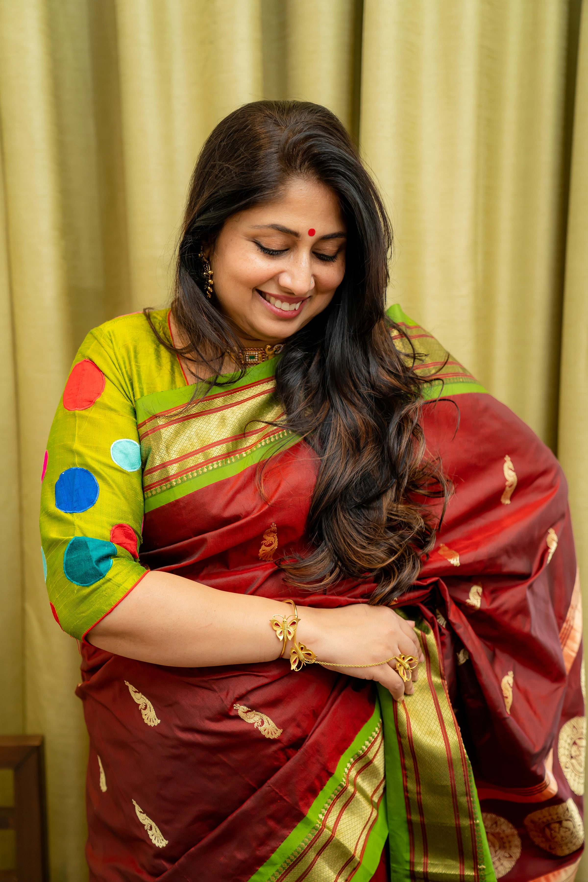 Pure silk Handwoven Paithani with traditonal pallu and chakra motifs