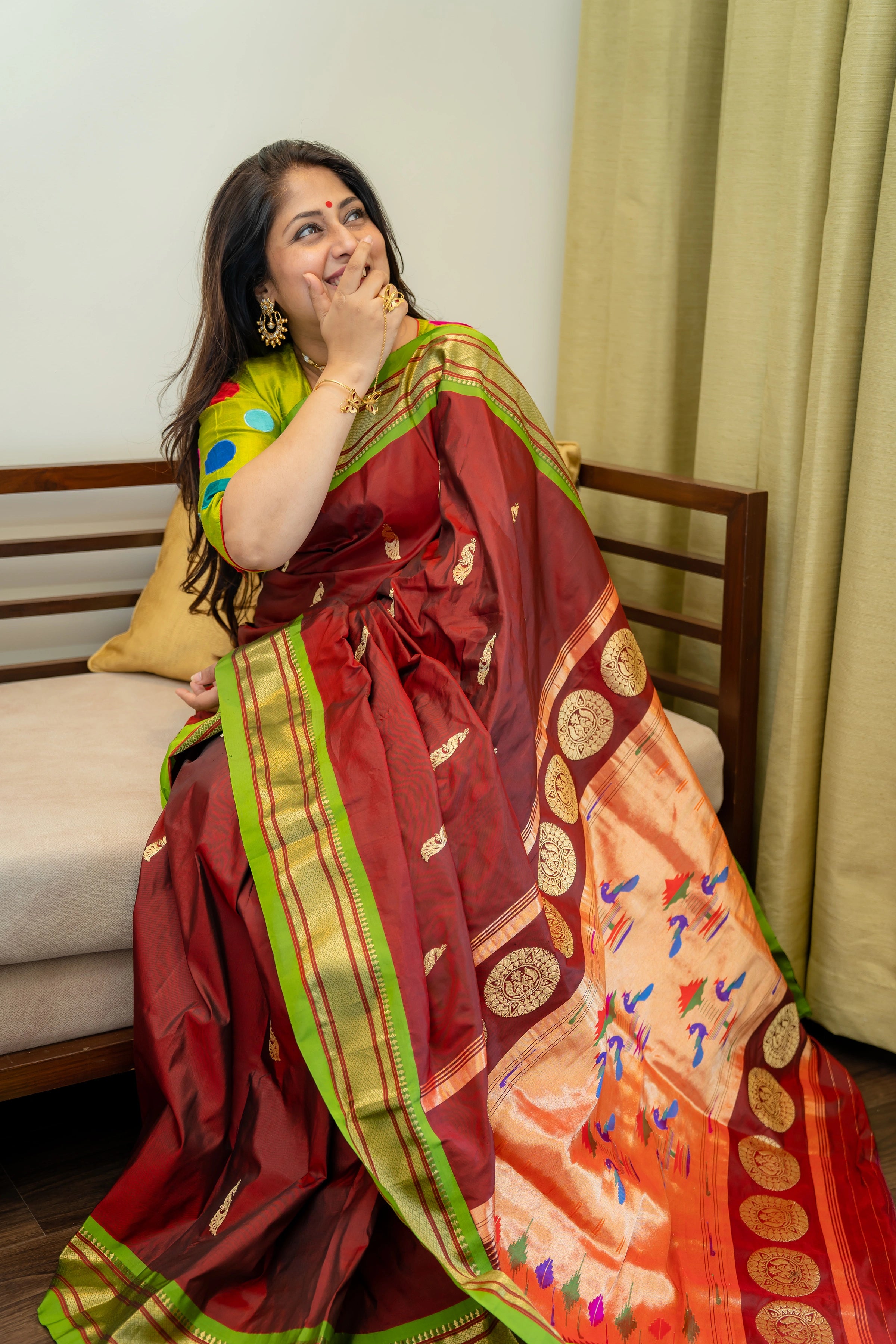 Pure silk Handwoven Paithani with traditonal pallu and chakra motifs