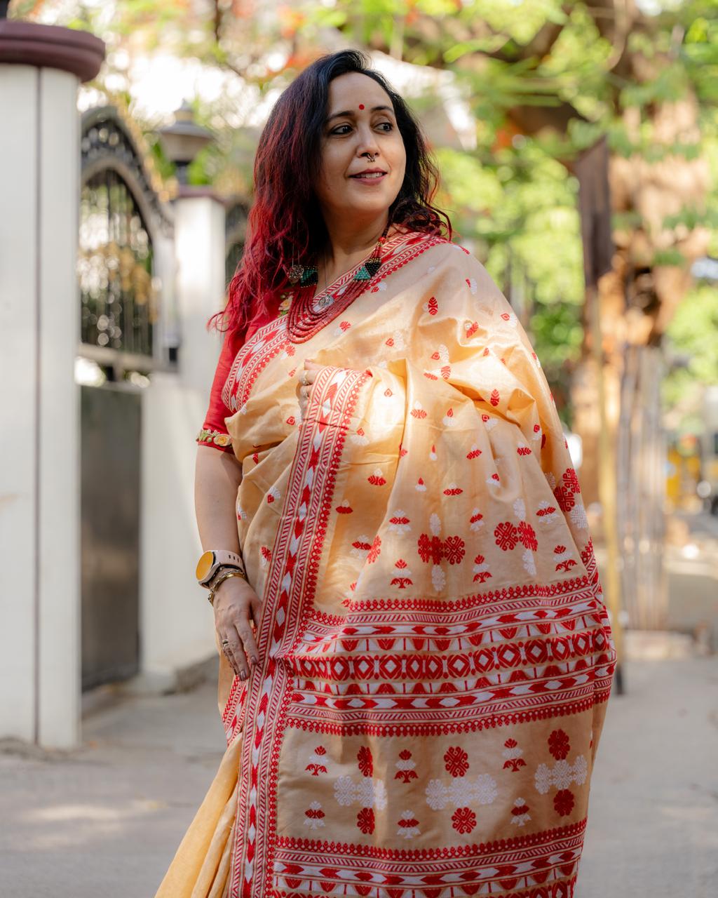 Traditional Assam Tussar Silk Saree with Red Border & Woven Motifs
