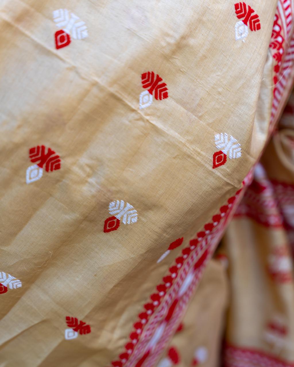 Traditional Assam Tussar Silk Saree with Red Border & Woven Motifs