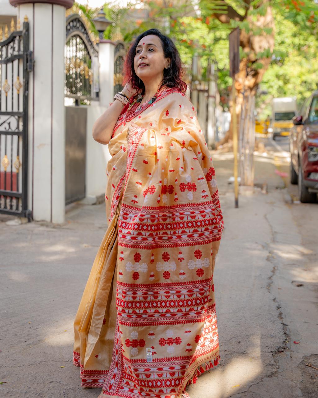 Traditional Assam Tussar Silk Saree with Red Border & Woven Motifs